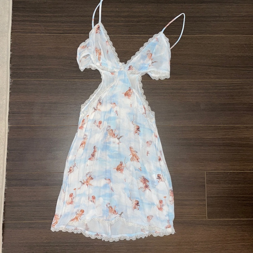 Light blue cut out slip dress with lace detail and zip up the back